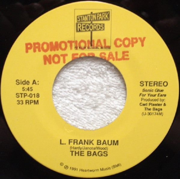 The Bags (2) : L. Frank Baum / Max Roach (7", Promo)