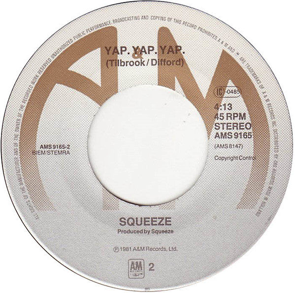 Squeeze (2) : Tempted (7", Single)