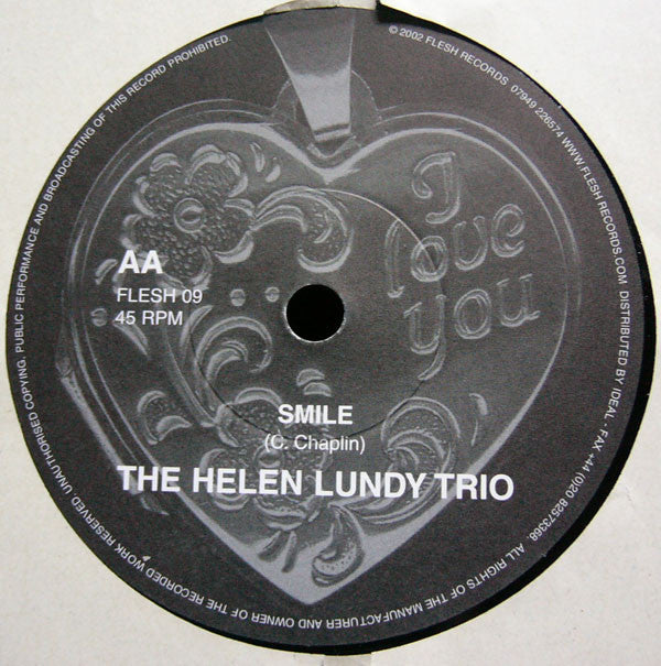 The Helen Lundy Trio : The More I See You / Smile (7")