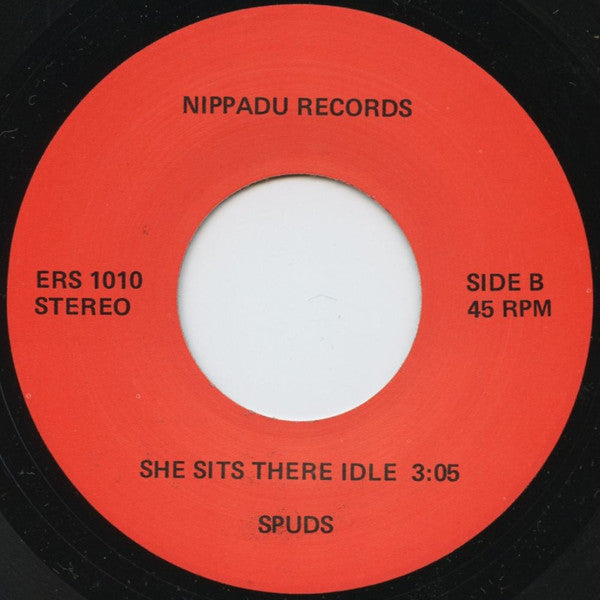 Spuds (3) : Strong Boy / She Sits There Idle (7", Single)