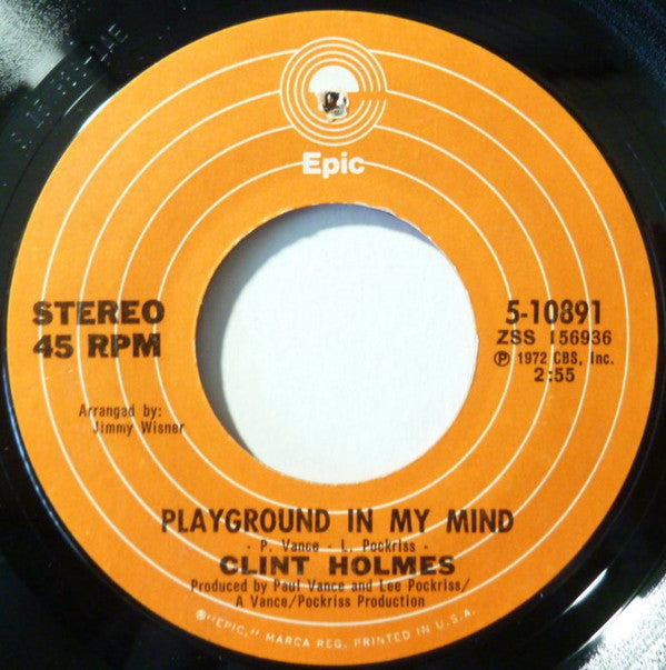 Clint Holmes : Playground In My Mind (7", Single, RP, Styrene, Ter)