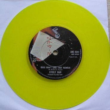 Steely Dan : Rikki Don't Lose That Number (7", Single, RE, Yel)