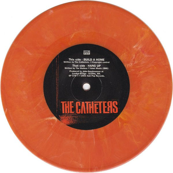 The Catheters : Build A Home (7", Single, Ora)