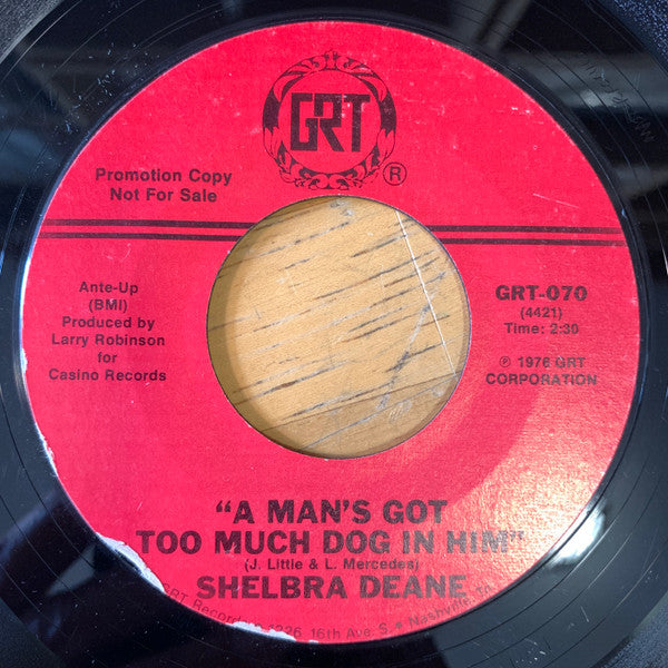 Shelbra Deane : A Man's Got Too Much Dog In Him / Smile Me A Song (7")