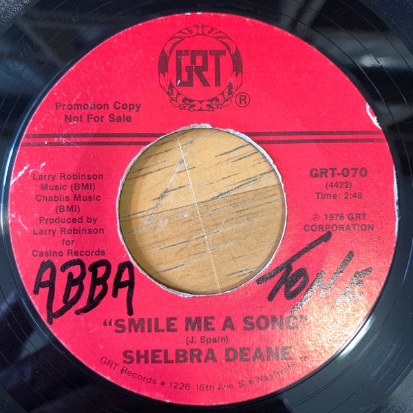 Shelbra Deane : A Man's Got Too Much Dog In Him / Smile Me A Song (7")