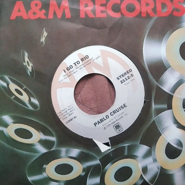 Pablo Cruise : I Go To Rio / Raging Fire (7", Styrene, Ter)