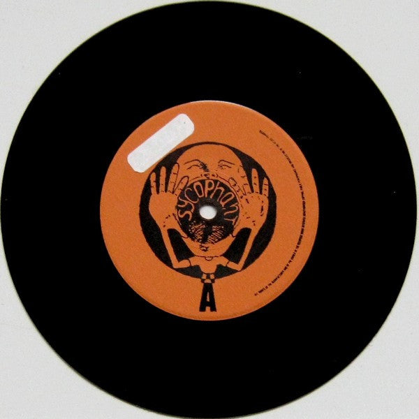 Skink : ....And Now The Sound Of... (7", Num)