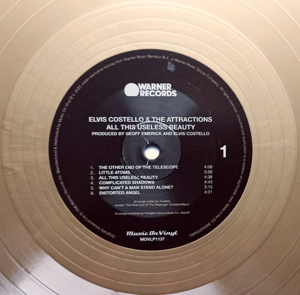 Elvis Costello & The Attractions : All This Useless Beauty (LP, Album, Ltd, Num, RE, Gol)