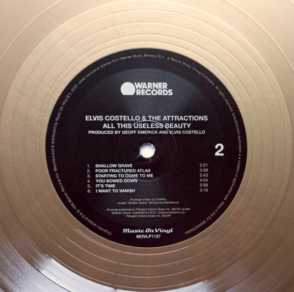 Elvis Costello & The Attractions : All This Useless Beauty (LP, Album, Ltd, Num, RE, Gol)