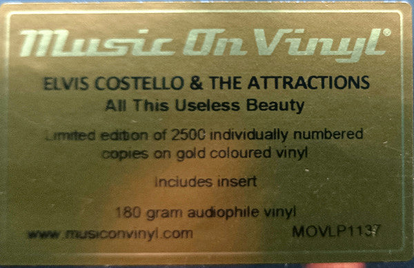 Elvis Costello & The Attractions : All This Useless Beauty (LP, Album, Ltd, Num, RE, Gol)