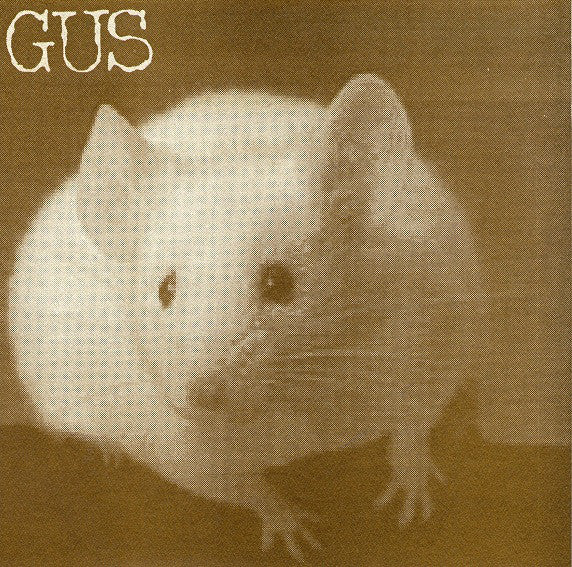 Gus (4) : Less Than / Her Backyard (7", Blu)