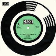 Ian Gomm : She'll Never Take The Place Of You / Hole In The Middle (7", Single)