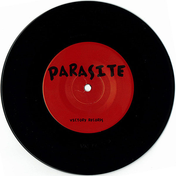 L.E.S. Stitches : Down The Drain b/w Parasite (7", Single)