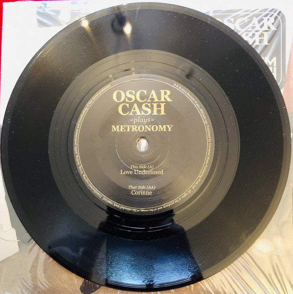 Oscar Cash : Oscar Cash Plays Metronomy (7", RSD, Single, Ltd)