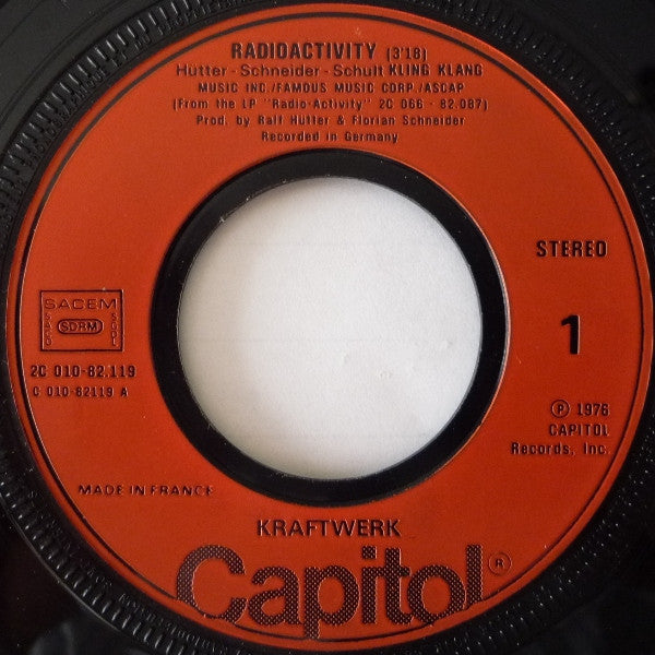 Kraftwerk : Radioactivity (7", Single, Ora)