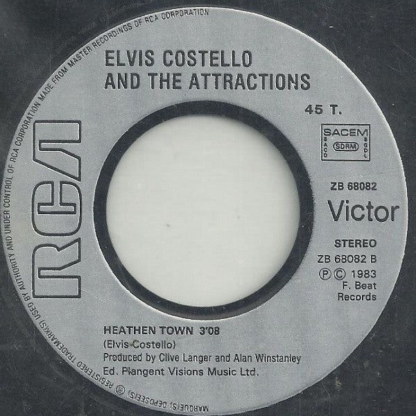 Elvis Costello And The Attractions* : Everyday I Write The Book (7", Single)