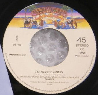 Shandi* : I'm Never Lonely (7", Single)