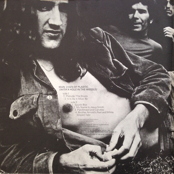 Man : 2 Ozs. Of Plastic With A Hole In The Middle (LP, Album, Ora)