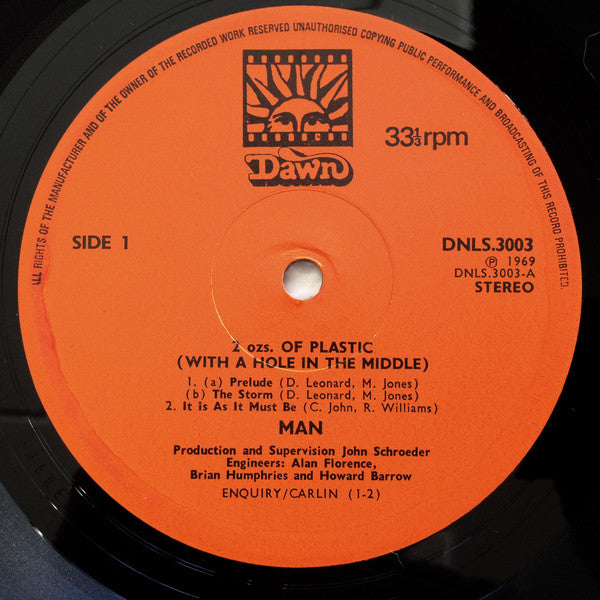 Man : 2 Ozs. Of Plastic With A Hole In The Middle (LP, Album, Ora)