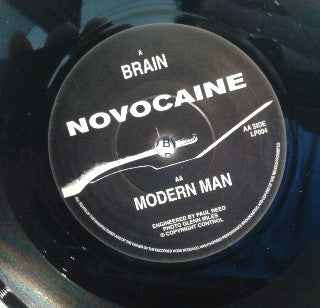 Novocaine (2) : Brain / Modern Man (7", Single)