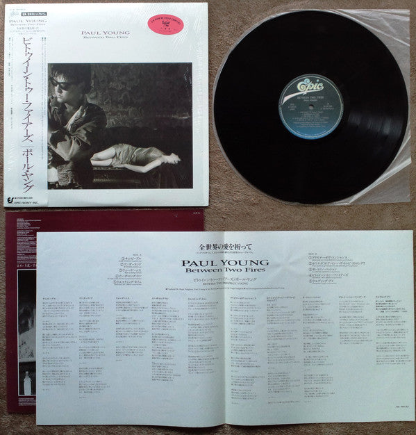 Paul Young : Between Two Fires (LP, Album)