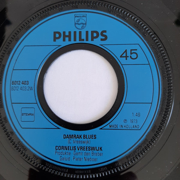 Cornelis Vreeswijk : De Bekommerde Socialist / Damrak Blues (7")