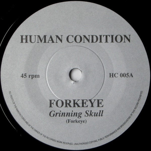 Forkeye : Grinning Skull (7", Num)