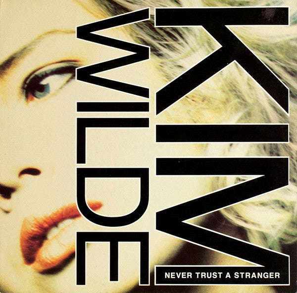 Kim Wilde : Never Trust A Stranger (12", Single)