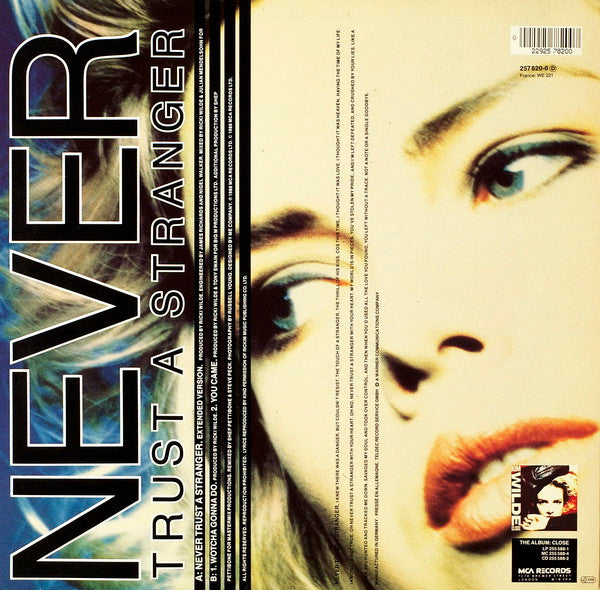 Kim Wilde : Never Trust A Stranger (12", Single)