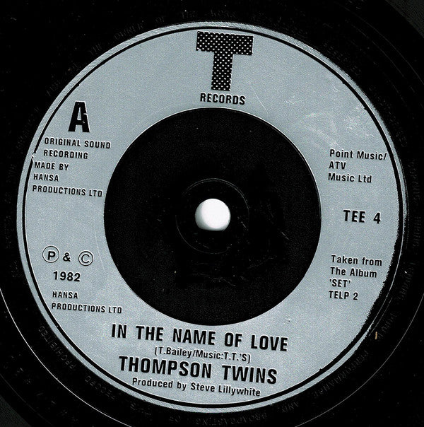Thompson Twins : In The Name Of Love (7", Single, Sil)