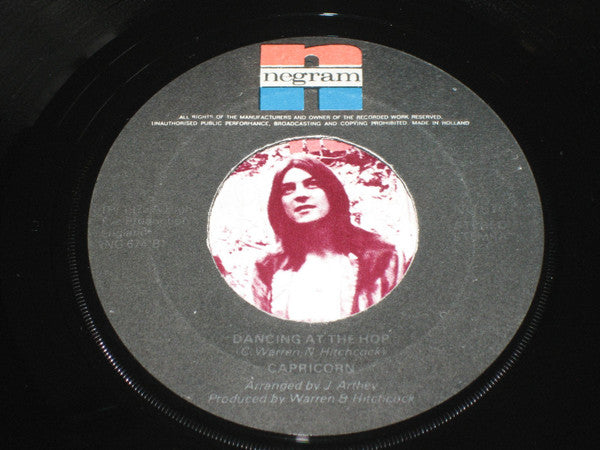 Capricorn (21) : Baby Likes To Do The Rock And Roll (7", Single)