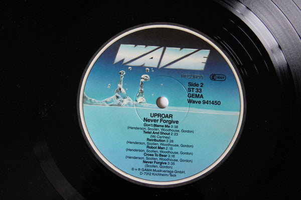 Uproar (2) : Never Forgive (LP, Album)