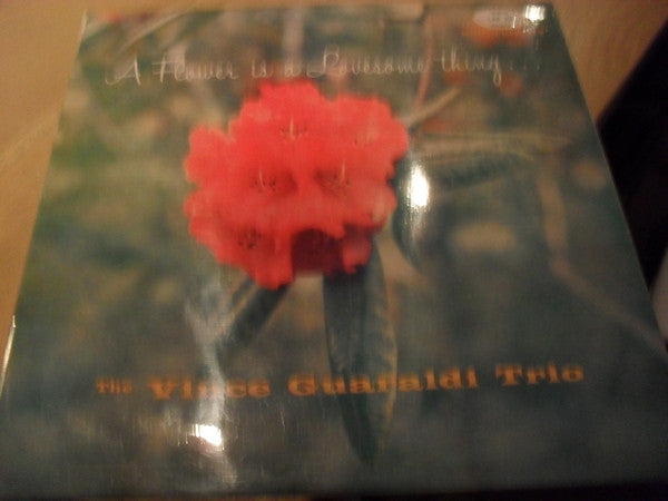 Vince Guaraldi Trio : A Flower Is A Lovesome Thing (LP, Album)
