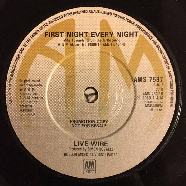 Live Wire (3) : Don't Bite The Hand (7", Single, Promo)